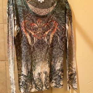 Long sleeve designer tee with rhinestone detail.